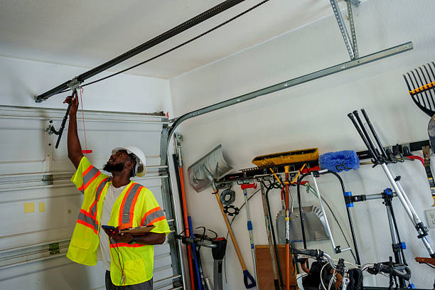 Professional Garage Door Panel Replacement technician working in Sweetser, IN
